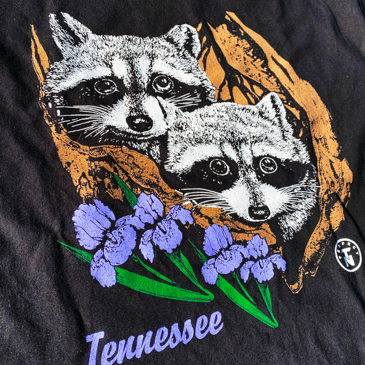 Tennesseee Raccoons in Stump with Iris Black Tee